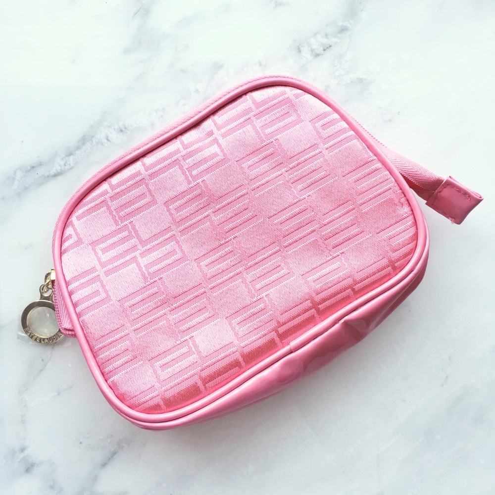 Estée Lauder pink monogram cosmetic case